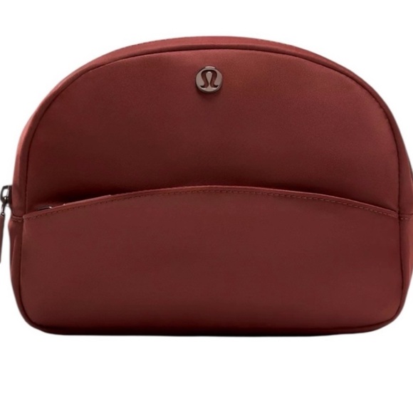 lululemon athletica Handbags - NWT Lululemon  Cranberry Pouch SOLD OUT